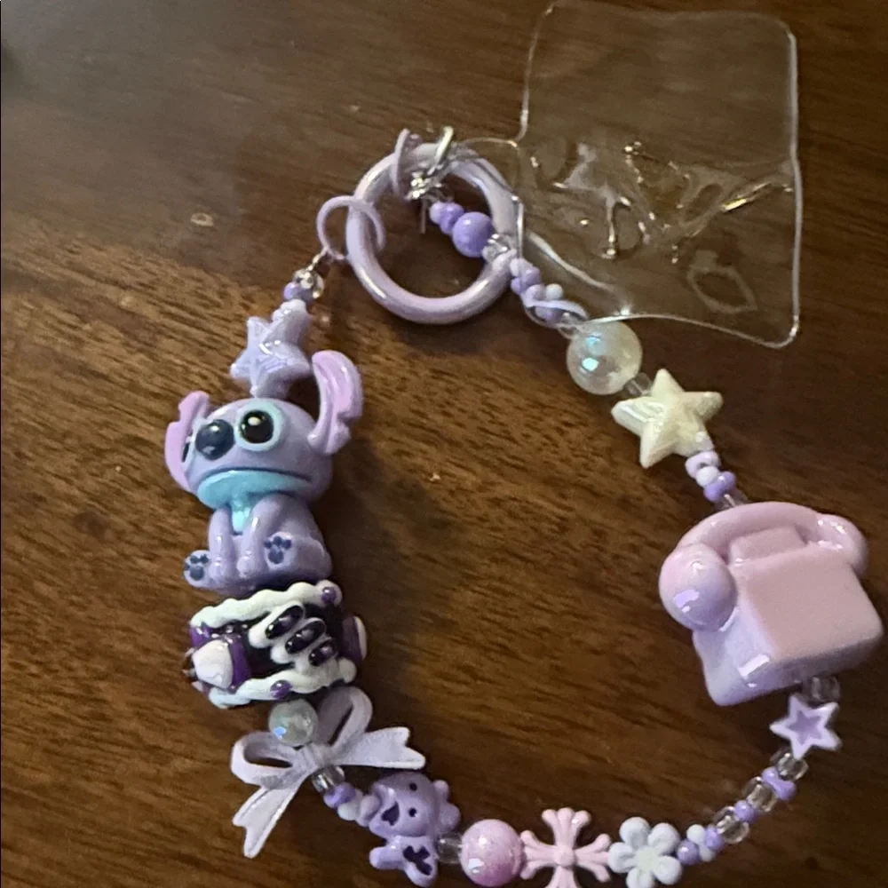 Purple stitch keychain‎